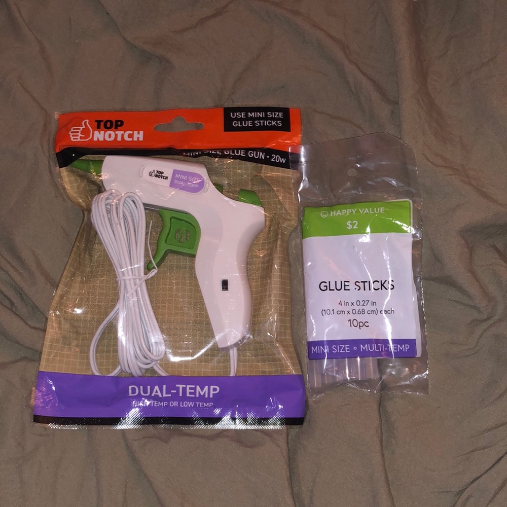 Brand new hot glue gun with glue sticks!